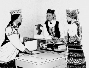 A Latvian, Estonian and Lithuanian (Aksana Naujokienė) wearing national costumes at the Soviet Union Industry and Trade Exhibition in London, 1968. Photo: from the private collection of A. Naujokienė